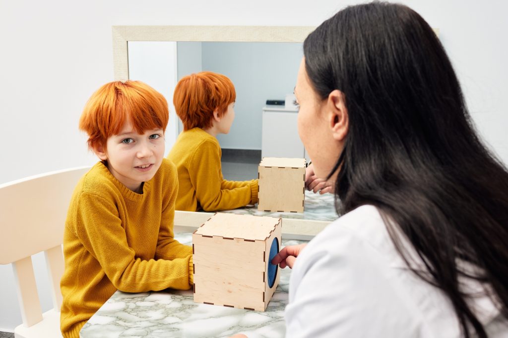 Autistic children. Care of child mental health with a child psychologist using a play psychotherapy